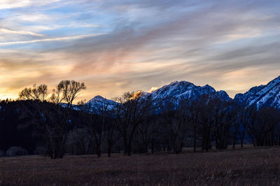 Scenic view of mountains against sky during sunset