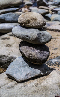 Close-up of stone stack on rock