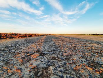 Surface level of road against sky