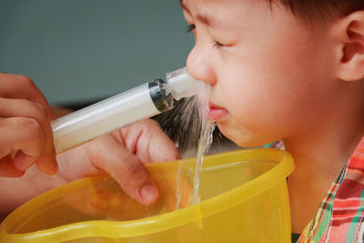 Close-up of boy holding ice cream