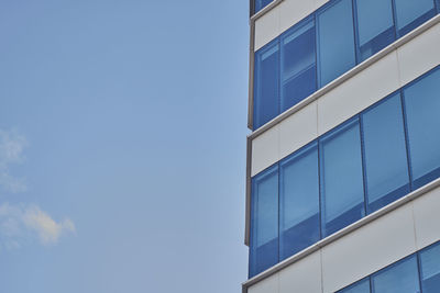 Low angle view of modern building against sky