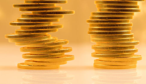 Close-up of coins on table