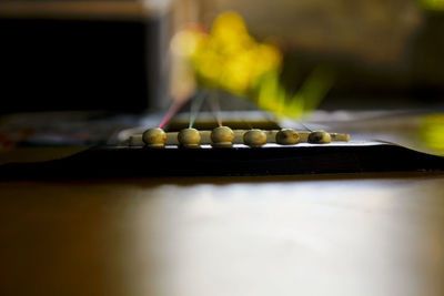 Close-up of electric lamp on table