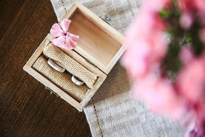 High angle view of pink flower in box