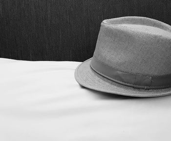 Close-up of hat on sofa