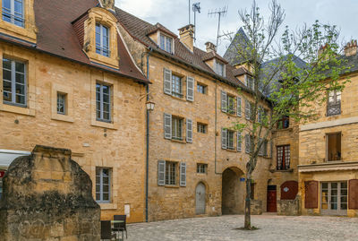 Low angle view of old building in city