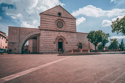 Facade of historic building against sky