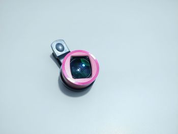 High angle view of multi colored pencils on white background