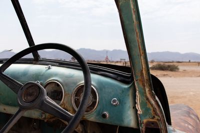 Close-up of abandoned car