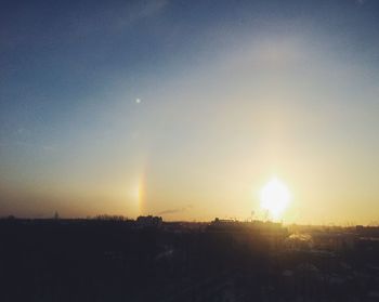Silhouette landscape against sky during sunset