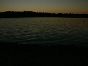 Scenic view of sunset over river