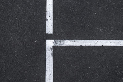 High angle view of arrow sign on road