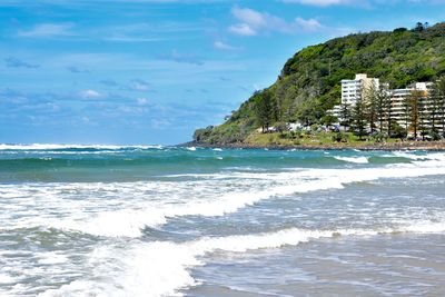 Scenic view of beach and sea against sky