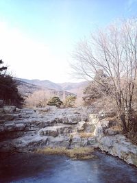 Scenic view of river stream against sky