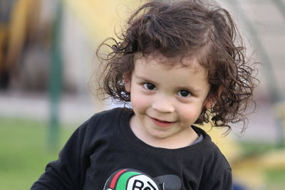 Close-up portrait of smiling boy