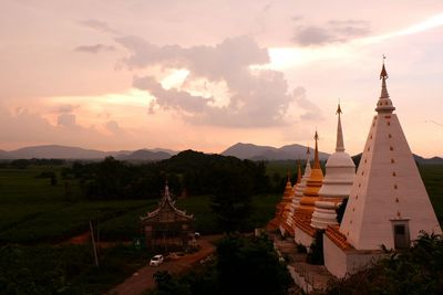 Panoramic view of buildings against sky during sunset