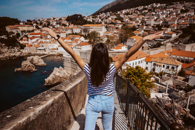 Rear view of woman standing at observation point