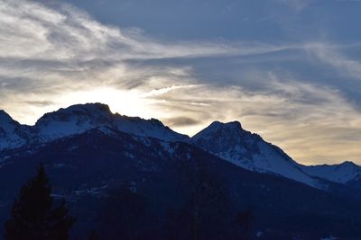 Scenic view of mountains against sky during winter