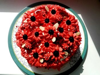 High angle view of strawberries in plate on table