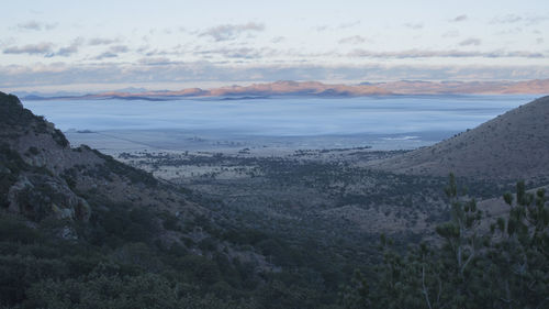 Scenic view of landscape against sky during sunset