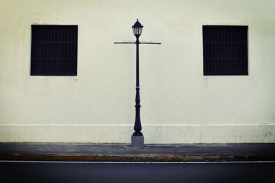 Street light against building