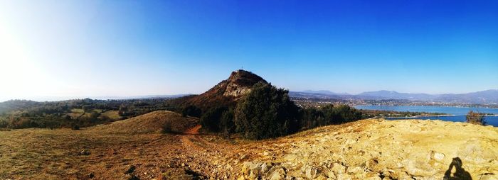 Scenic view of mountain against clear blue sky