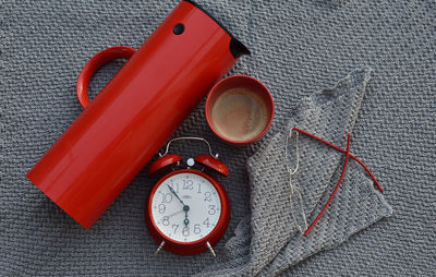 Close-up of clock on table