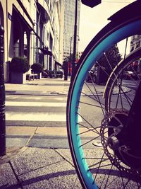 Close-up of bicycle on street