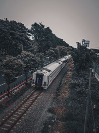 Train on railroad track against sky