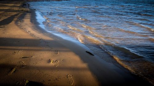 High angle view of surf on beach