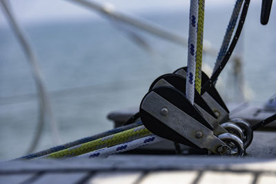 Close-up of rope tied to pulley on boat