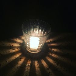 Low angle view of illuminated light bulb