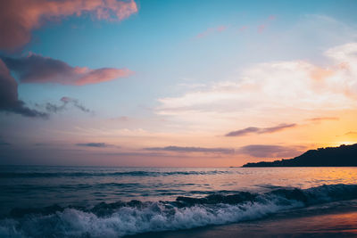 Scenic view of sea against sky during sunset