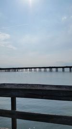 Pier on sea against sky