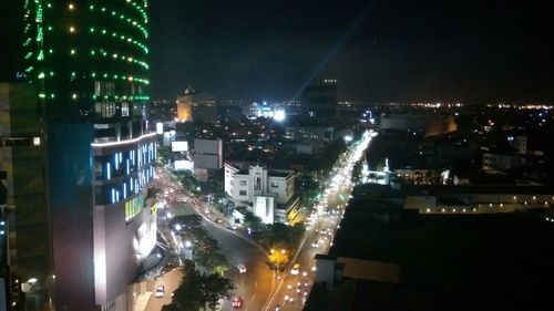 Illuminated cityscape at night