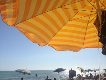 Scenic view of beach against clear sky