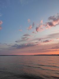 Scenic view of the river against the romantic sky at sunset