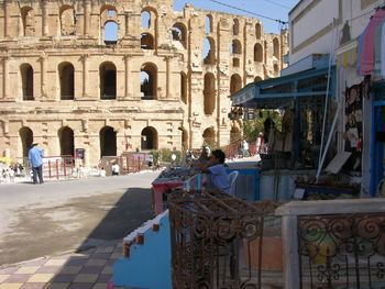 People in front of historical building