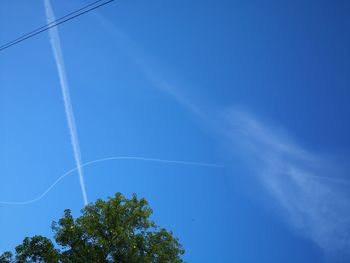 Low angle view of vapor trail in sky