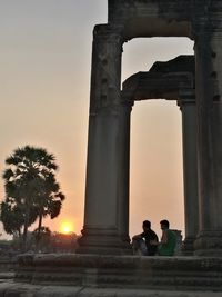 Silhouette of tourists at sunset