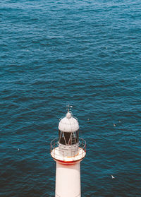 High angle view of lighthouse in sea