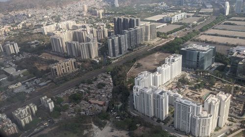 High angle view of modern buildings in city