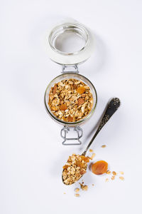 High angle view of breakfast served on white background