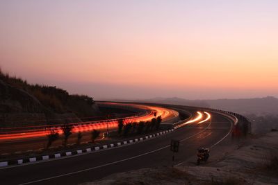 Road against sky during sunset