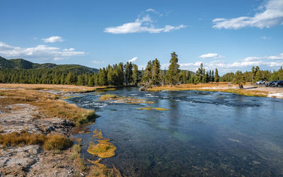 View of beautiful firehole river in midway geyser at yellowstone park