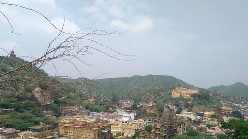 Aerial view of townscape against sky