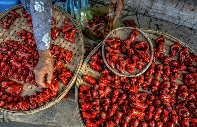 High angle view of red chili peppers for sale at market