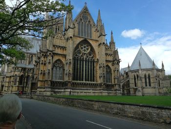 Facade of historic building against sky