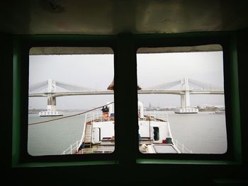 Suspension bridge seen through ship