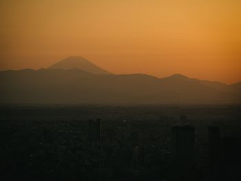 View of cityscape at sunset